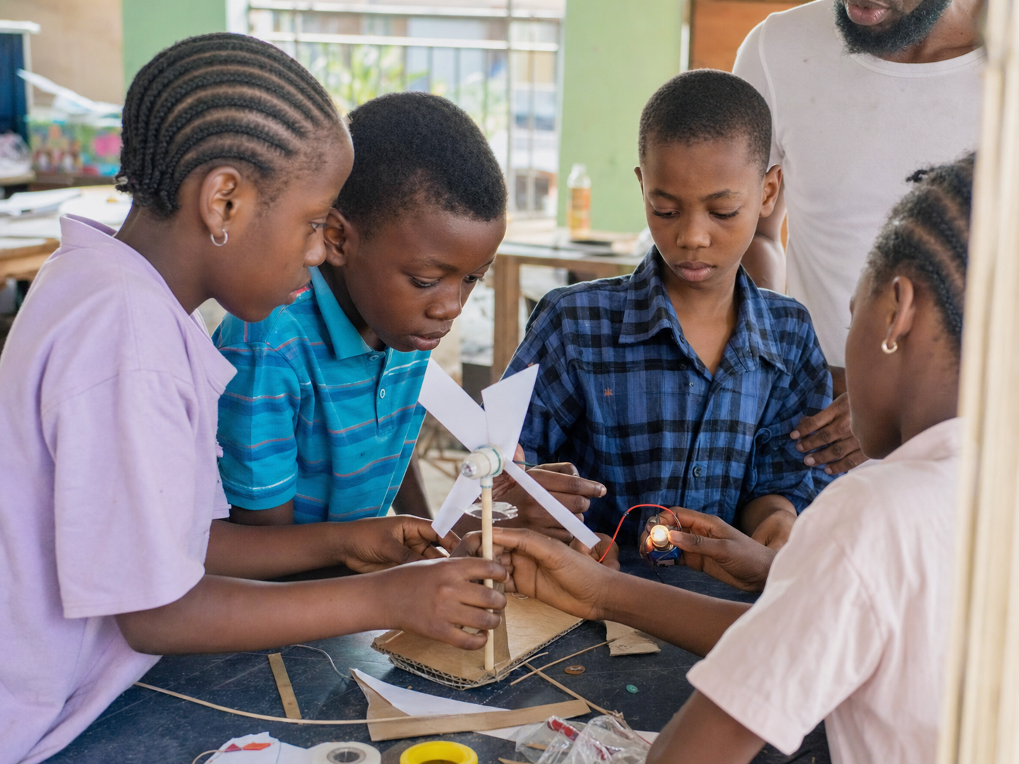 Nigerian children exploring a hands-on science project